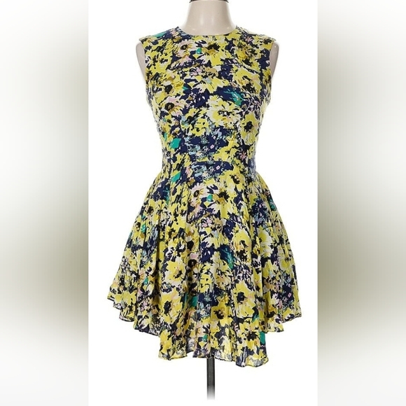H&M Dresses & Skirts - H&M Yellow Floral Skater Asymmetrical Peplum Dress Zip Back Mini